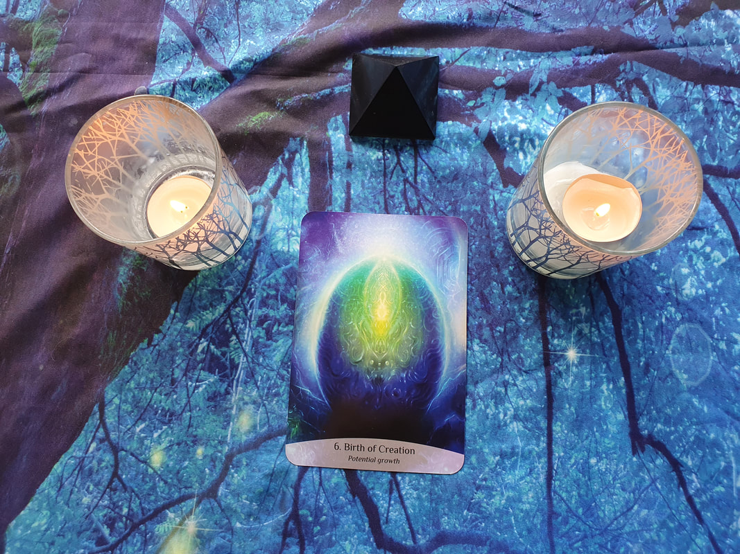 Picture of aquarius oracle card for October